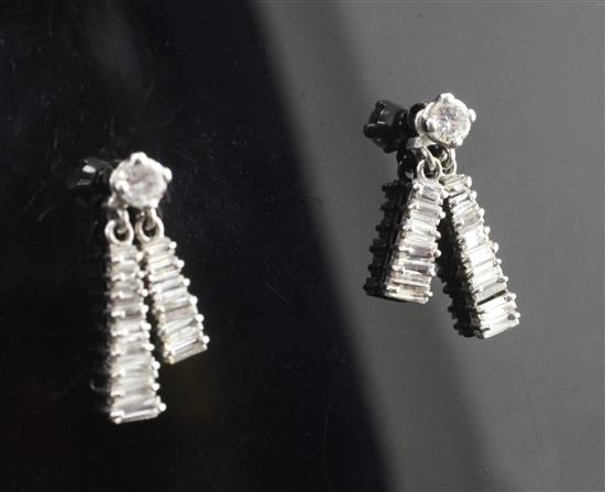 A pair of white gold and diamond double tassel drop earrings, 19mm.